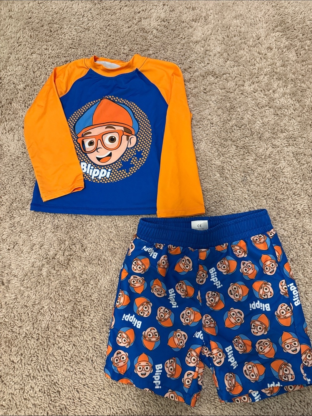 Blippi Kids Orange & Blue Long-Sleeve Rashguard and swim trunks set size 3T